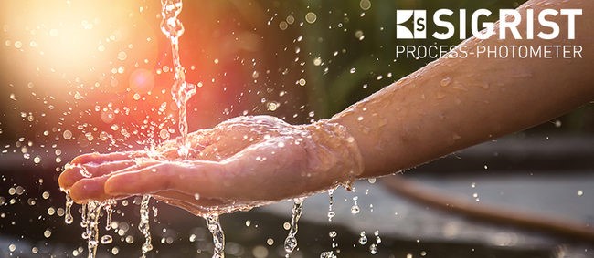 hand being washed with water